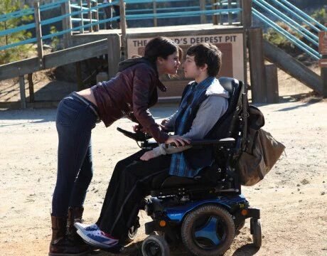 Dot and Trevor kiss in The Fundamentals of Caring.