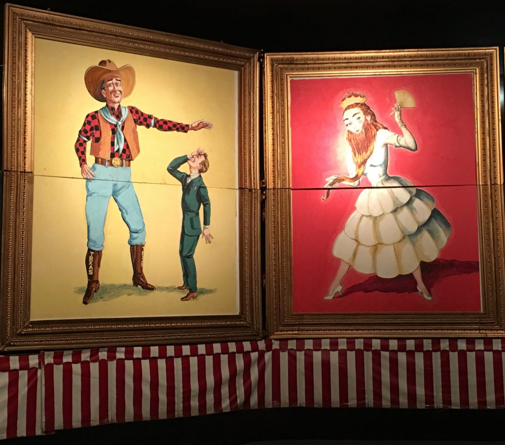 Vintage sideshow performers depicted in paintings at the wheelchair accessible Sarasota, Florida Ringling Circus Museum.