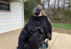 Karin wearing a plague doctor mask.